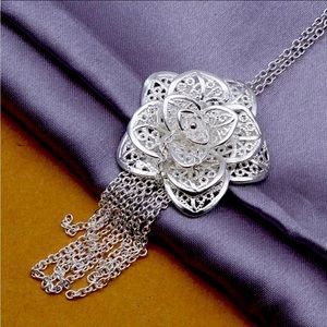925 Sterling Silver necklace with a flower charm!